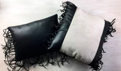 Декор спальни. Кожаные подушки с бахромой