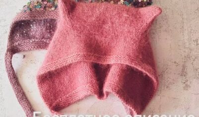 Яркая шапка-ушанка с пайетками и мягким плюшевым мехом, украшенная объемным помпоном и декоративными ушками, создающими уютный и игривый образ.