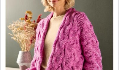 Объемный пульовер с выразительными косами и мягкой текстурой, создающий эффект уютного объема и оригинальности.