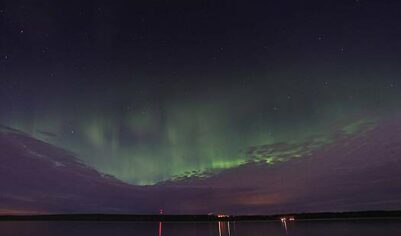 Сразу в нескольких регионах России заметили полярное сияние